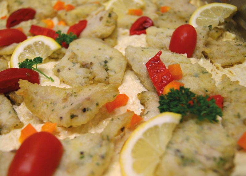 Zanderfilet auf Rahmsauerkraut mit Zitrone