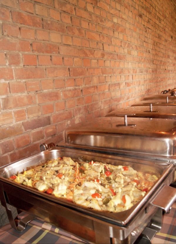Zander mit Kirschtomaten im Chafing Dish